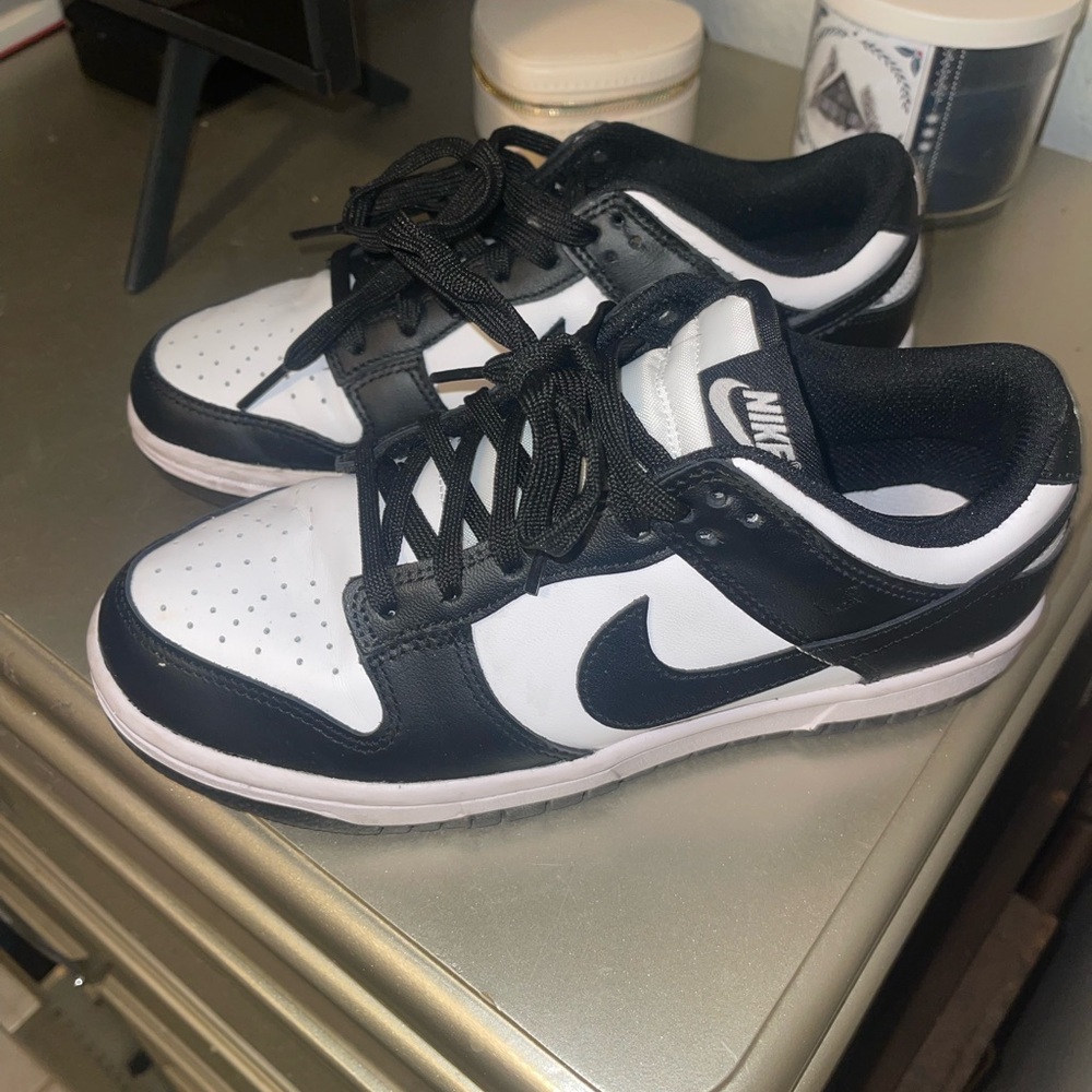 Women’s- black and white dunks size 7.5